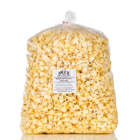 Full party-size bag of Del's seasoned popcorn, packed with fresh popped kernels