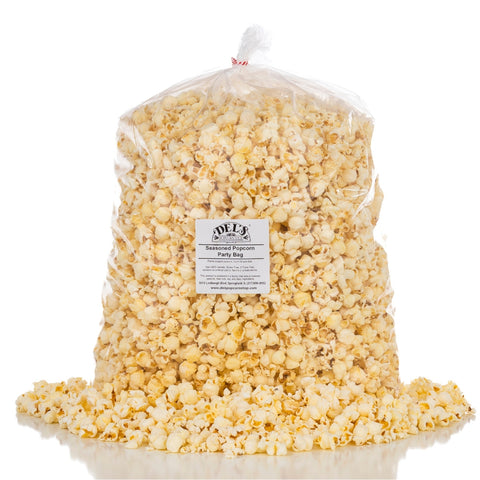 Del's Popcorn Shop seasoned popcorn party bag filled with popped kernels