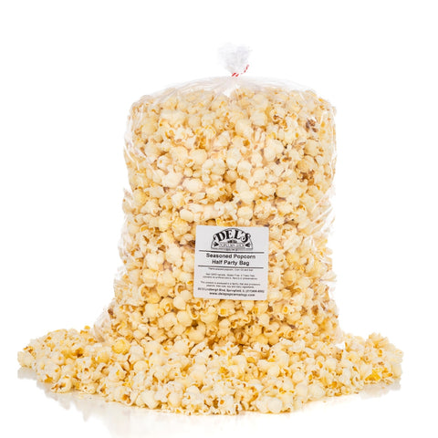 half party bag of Del's seasoned popcorn with kernels