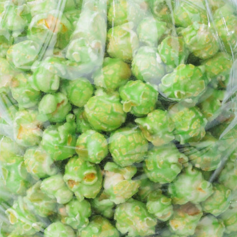 Green vanilla candy-coated popcorn from Del's shown in a close-up view