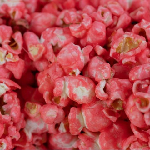 Close-up of Del's pink vanilla candy-coated popcorn