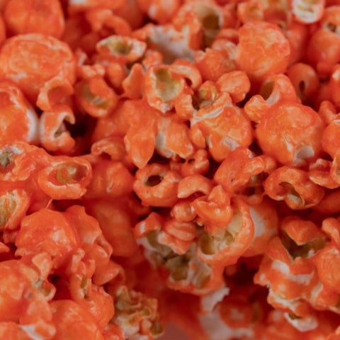 Close-up of Del's red vanilla candy-coated popcorn