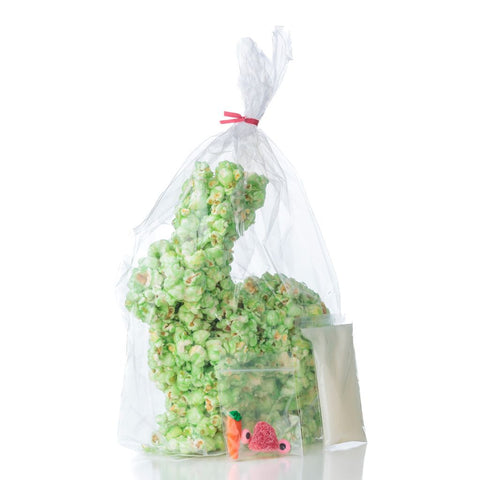 Green popcorn Easter bunny packed in a transparent cellophane bag