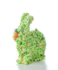 Green popcorn Easter bunny with orange nose and pink eyes on a white background