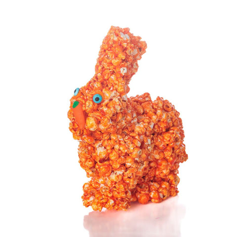 Orange Popcorn bunny for Easter with blue eyes and orange nose. 