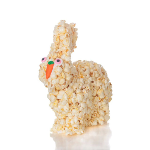 White Popcorn bunny for Easter with a carrot nose on a white background