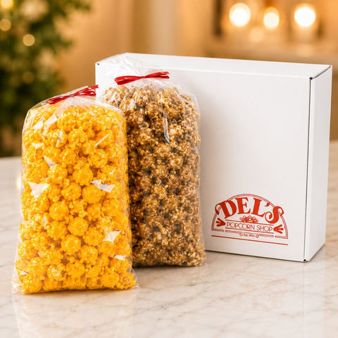 Medium White Del's Popcorn Gift Box with gourmet caramel and cheese popcorn.