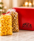 Small Red Del's Popcorn Gift Box with fresh caramel corn and cheese popcorn in a signature red gift box