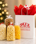 The Snack Attack contains Cheddar Cheese, caramel, kettle, and seasoned popcorn